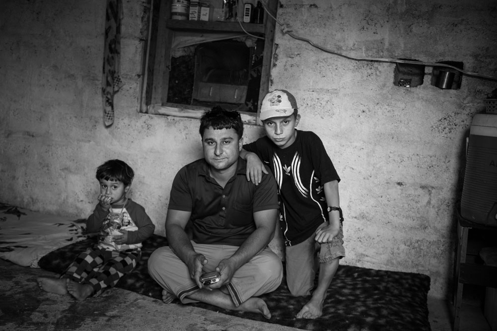  تصوير الكساندر افونسو - نازحون ايزديون لا يملكون شيئا لكنهم يهبون كل شيء 